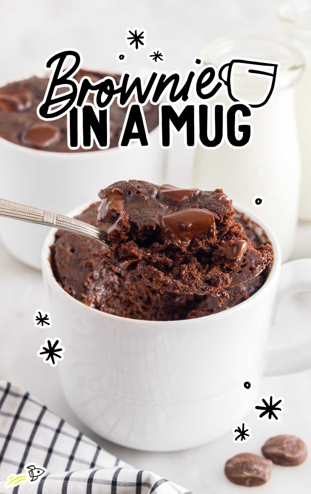 a close up shot of Brownie in a Mug with a spoon full