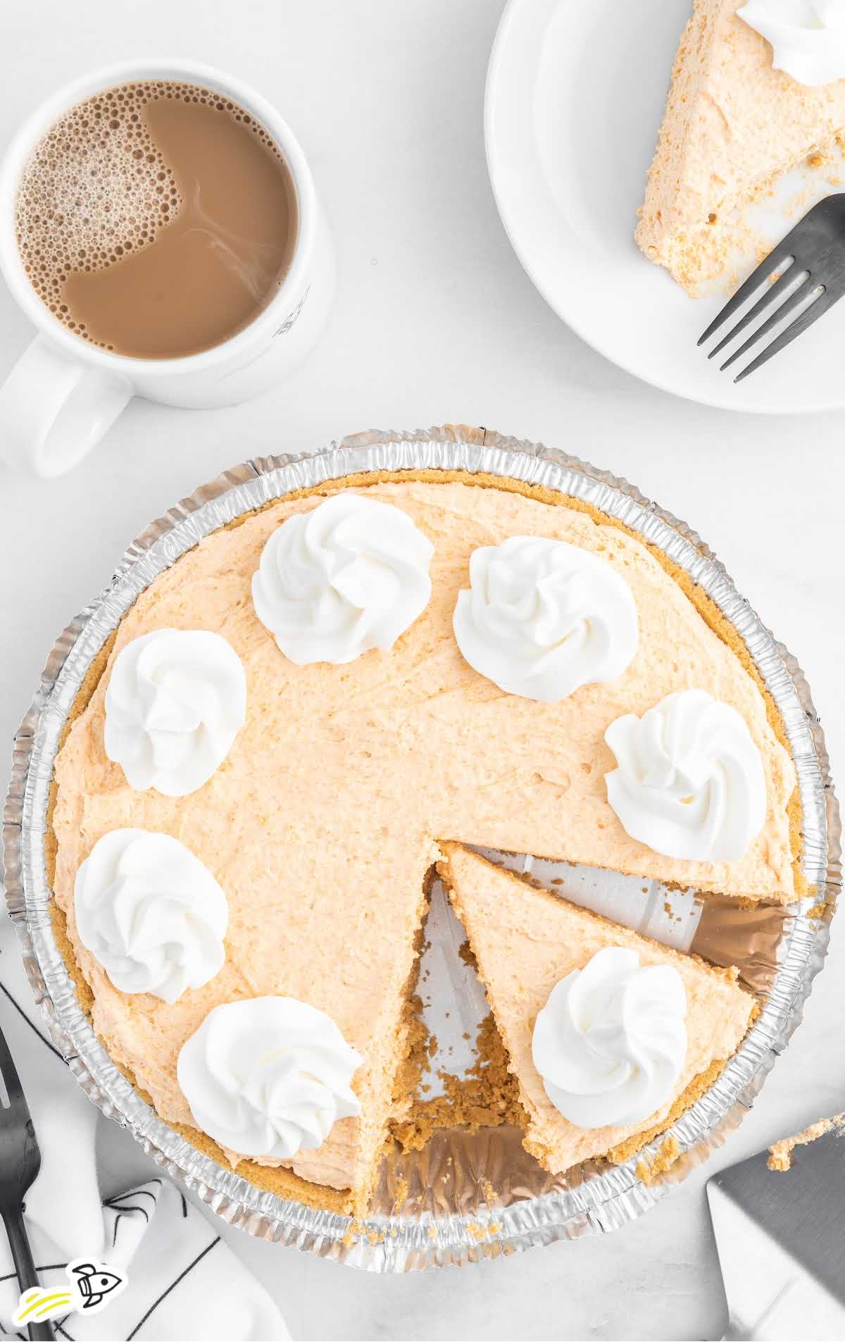 overhead shot of Butterscotch Cool Whip Pie with slices cut off