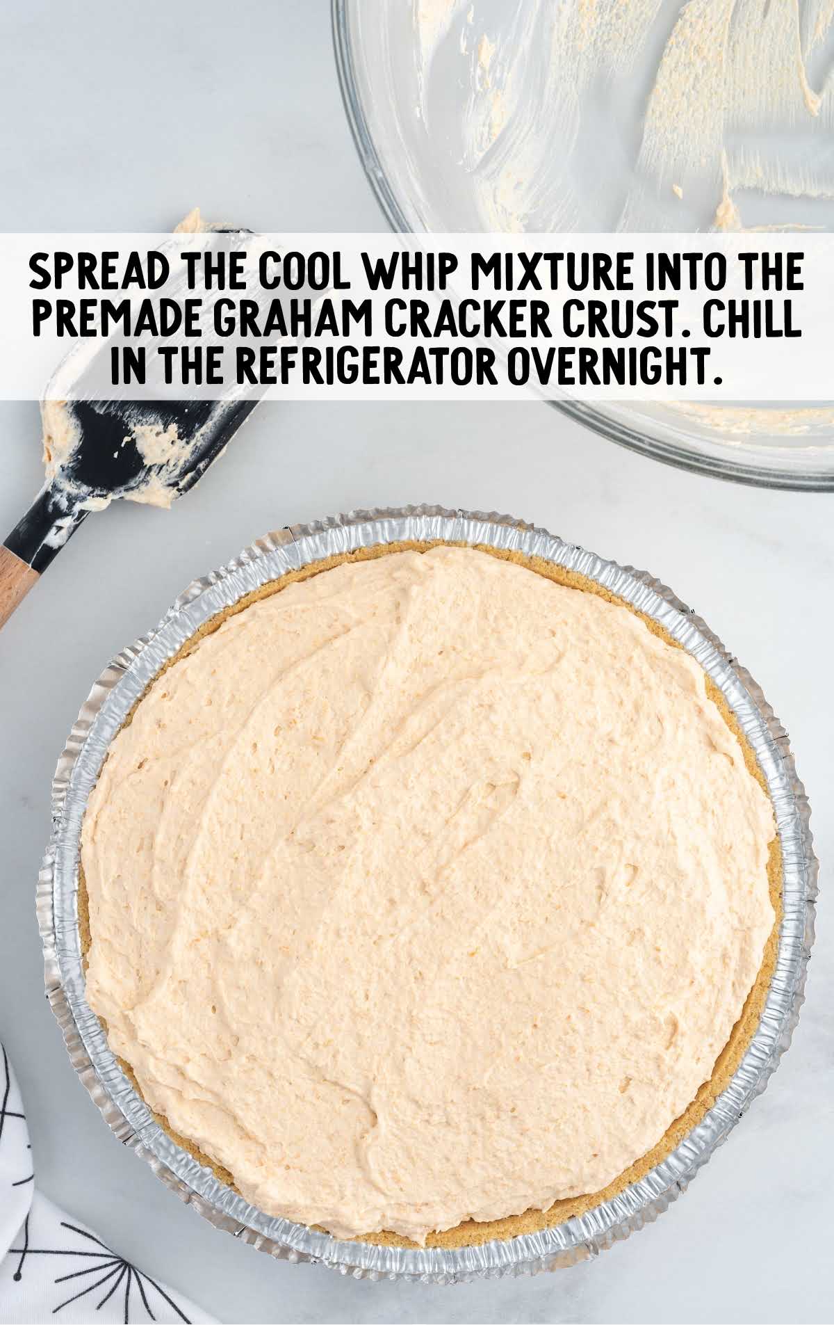 cool whipped mixture spread into the graham cracker crust