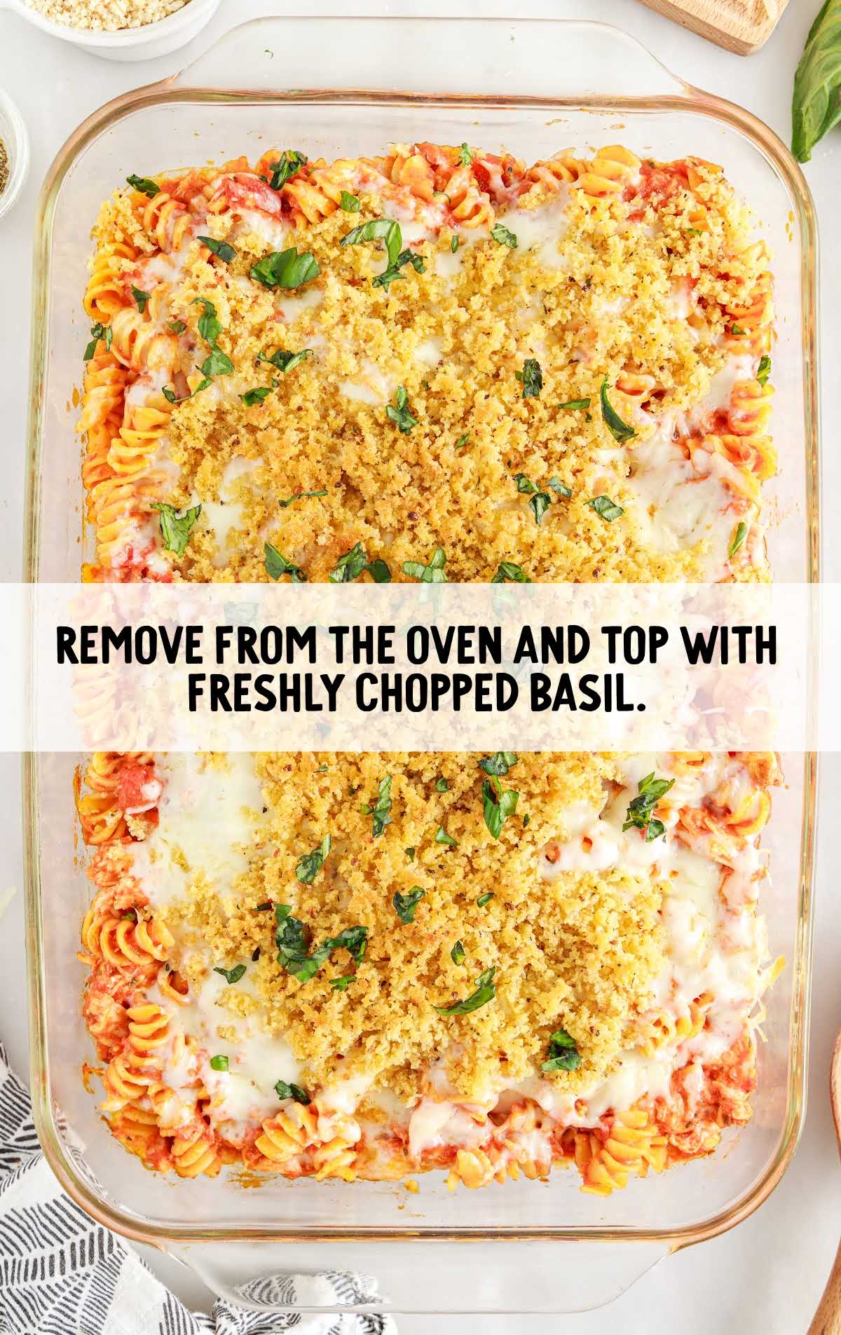 top casserole with chopped basil