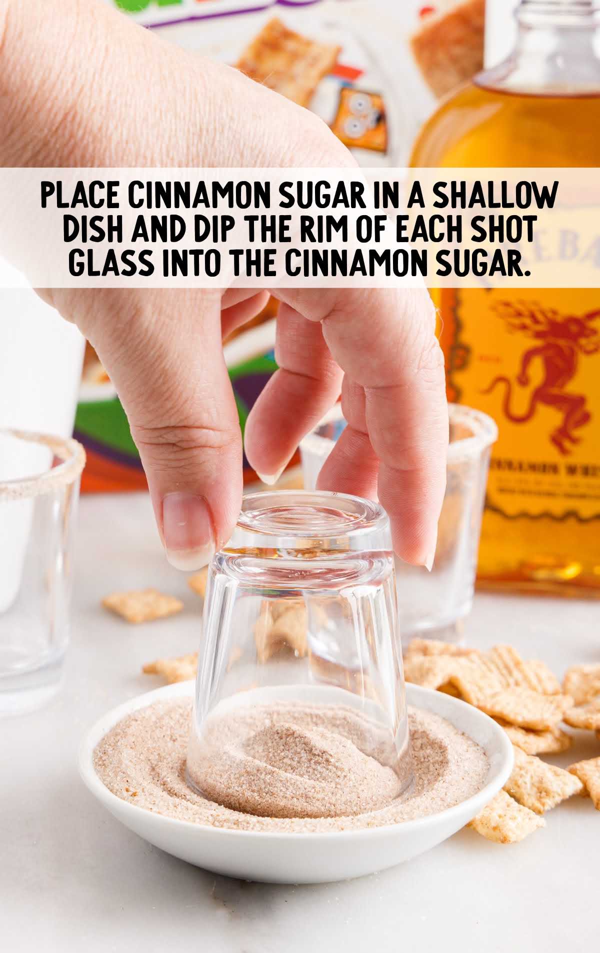 glass rim being dipped into a cinnamon sugar