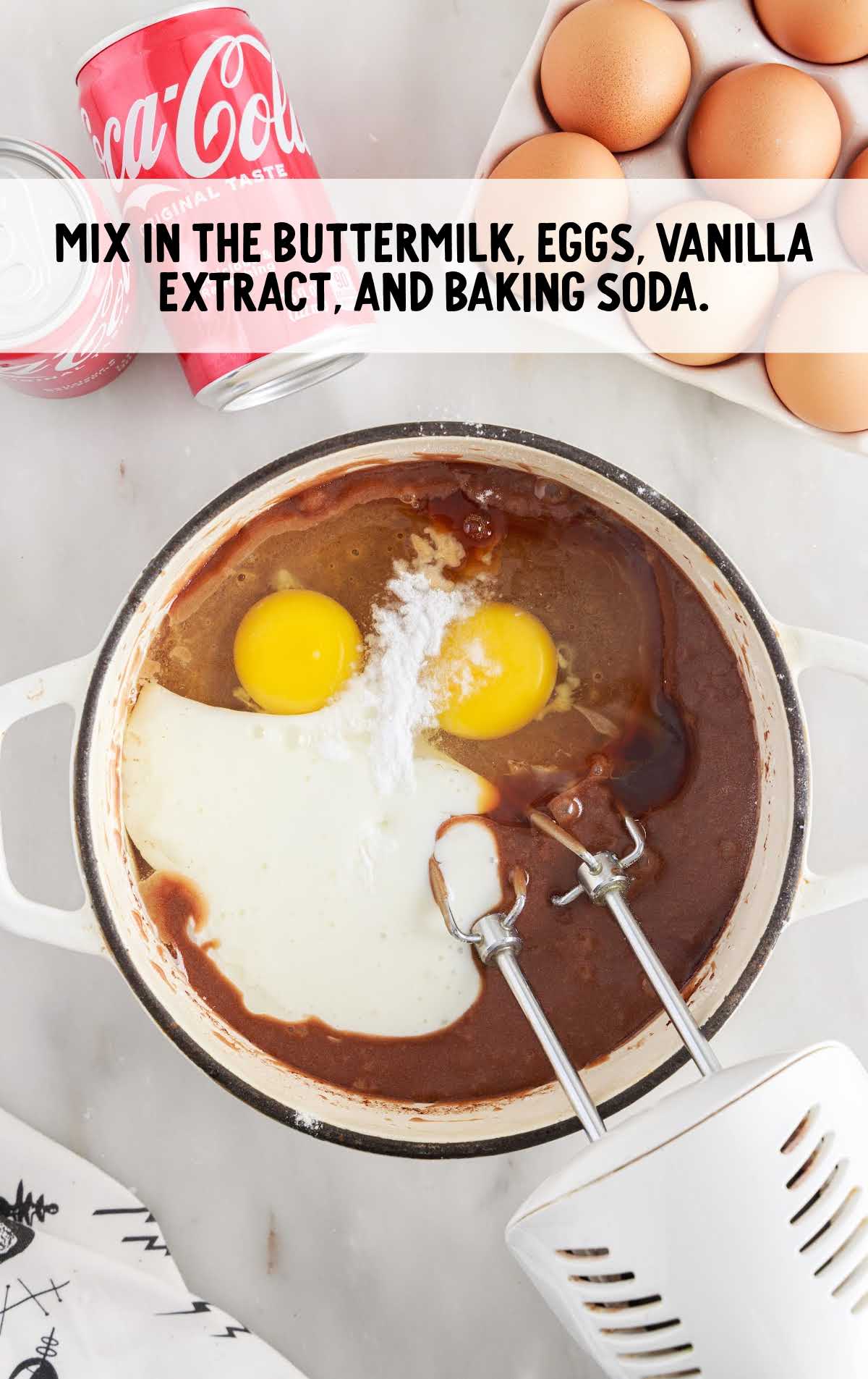 buttermilk, eggs, vanilla extract, and baking soda mixed in a bowl