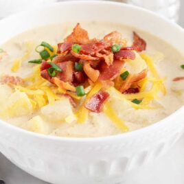 a close up shot of Crockpot Potato Soup in a bowl