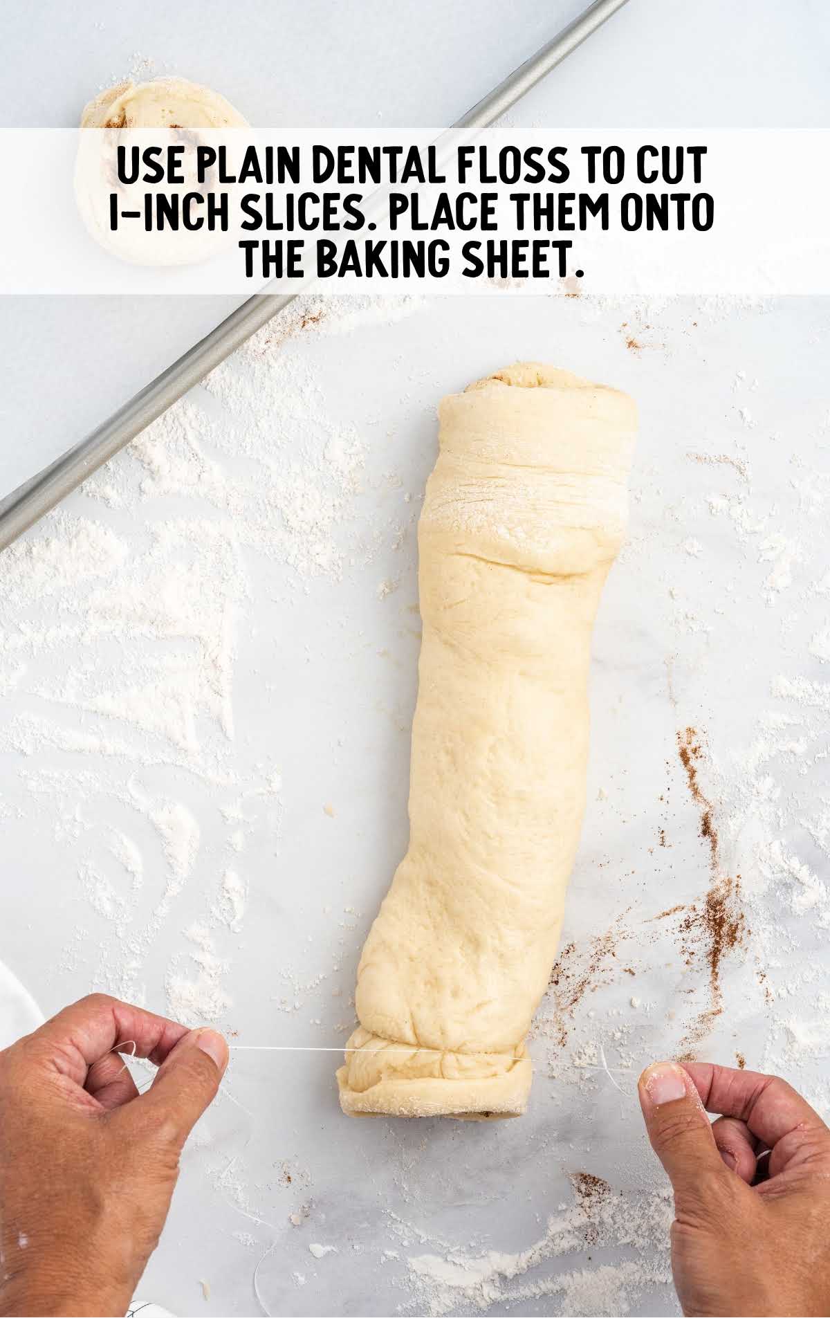 using plain dental floss cut dough and place onto a baking sheet