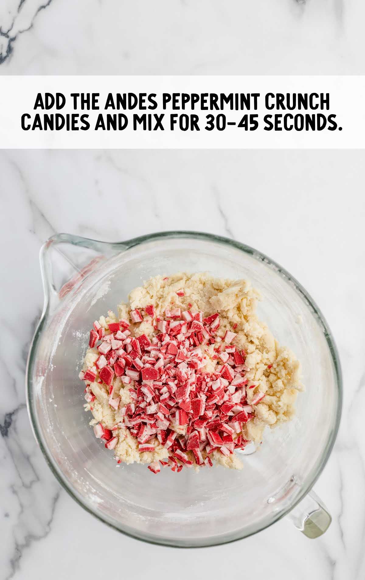 peppermint candies added to the ingredients in the bowl