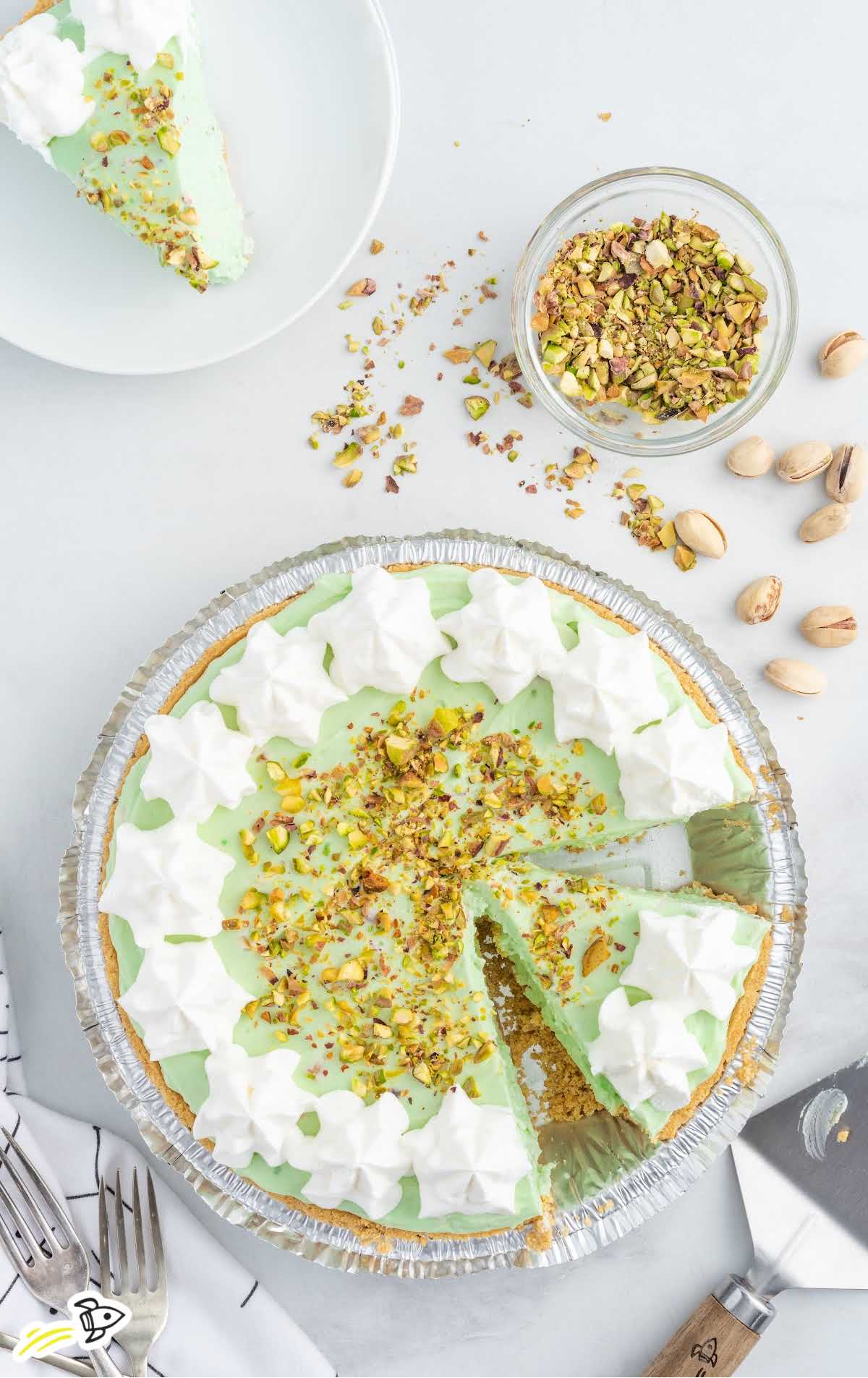 overhead shot of Pistachio Pie with a slice taken out