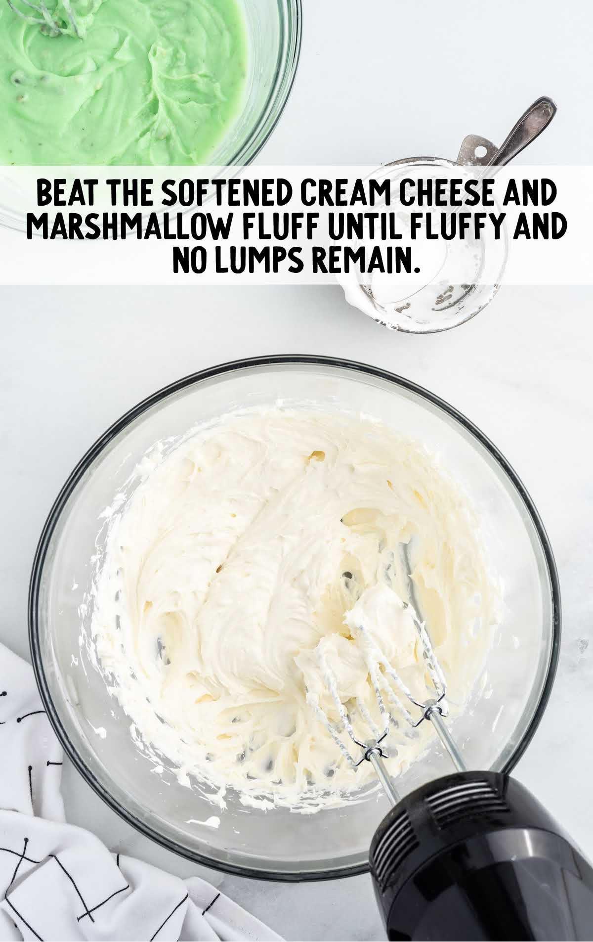 softened cream cheese and marshmallow fluff blended in a bowl