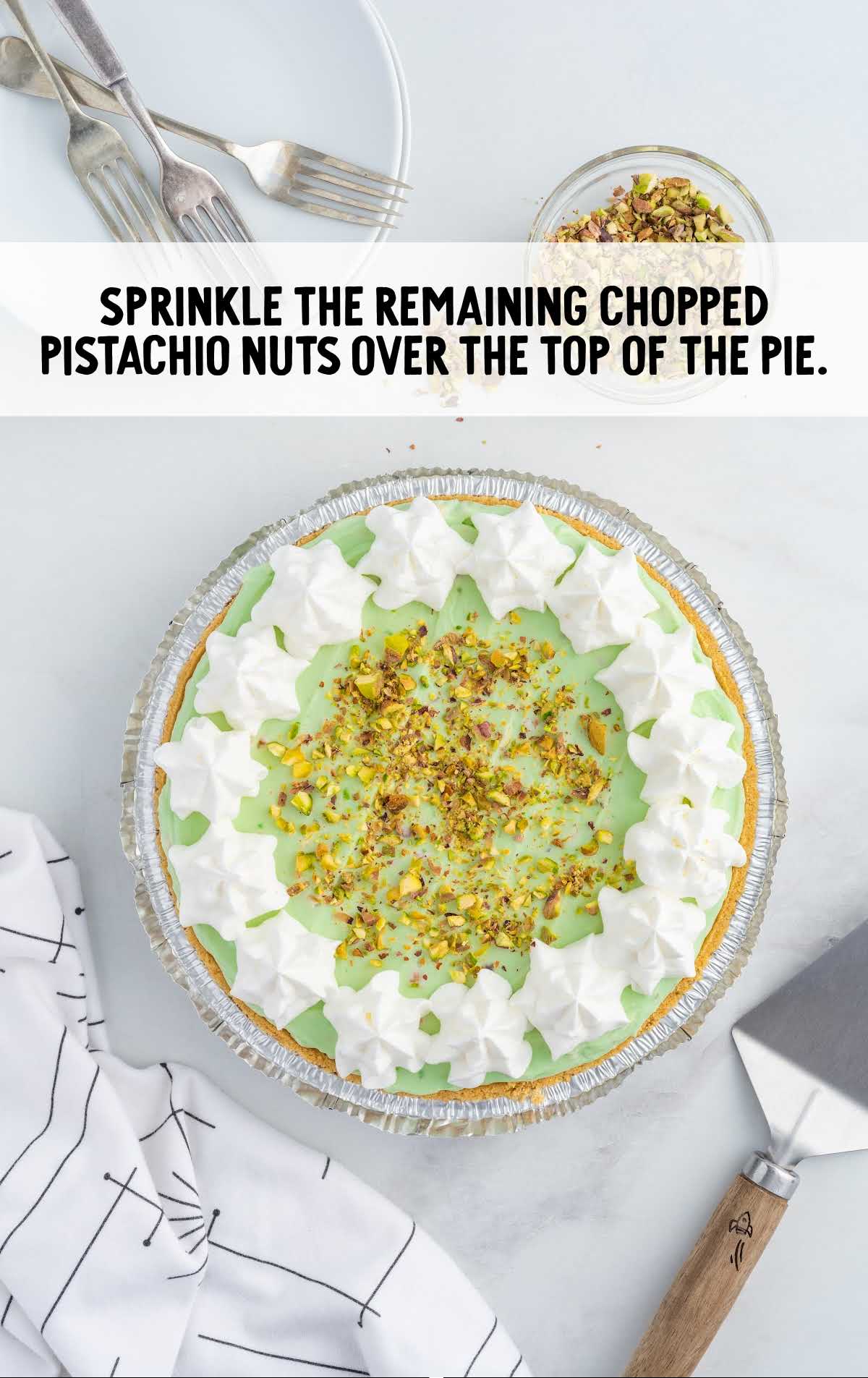chopped pistachio sprinkled over the top of the pie