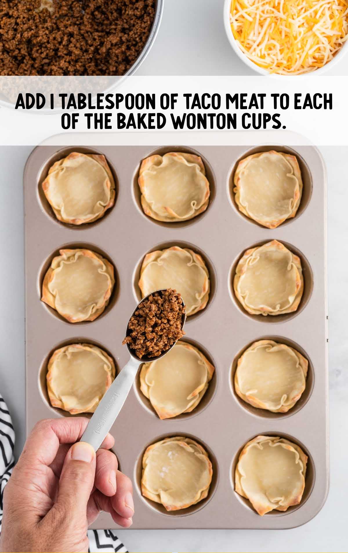 taco meat added to the baked wonton cups