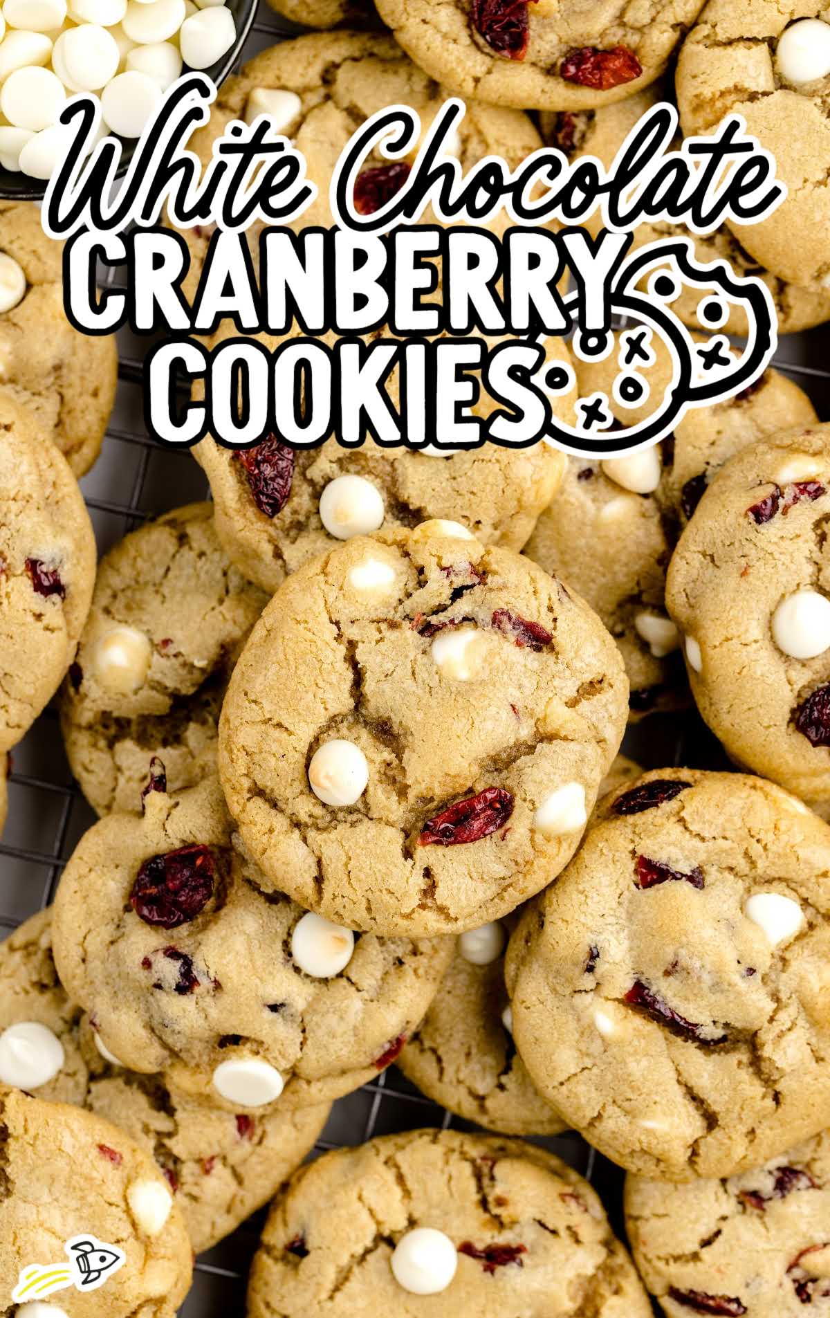 close up shot of White Chocolate Cranberry Cookies stacked on top of each other