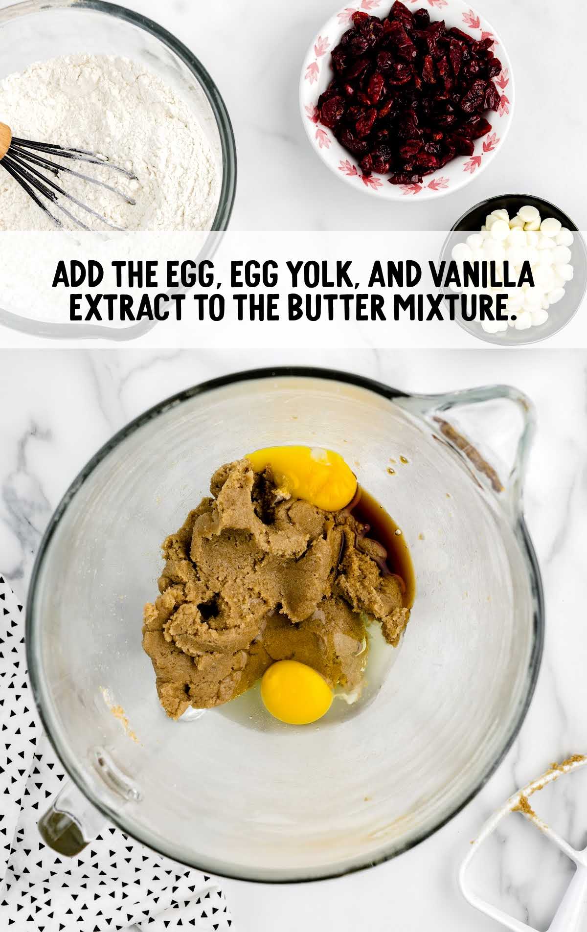 egg yolk, egg, and vanilla extract combined to the butter mixture