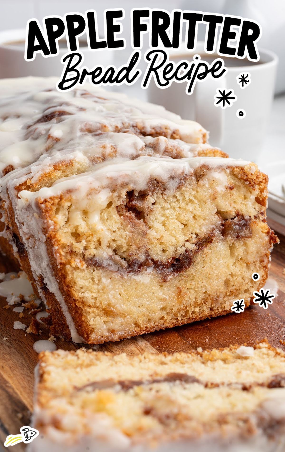 Thick slices of apple fritter bread showing cinnamon apple layers and icing.