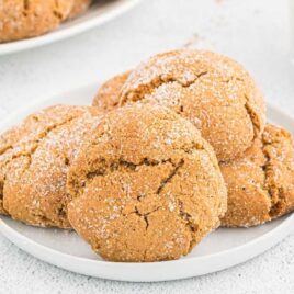 a close up shot of Gingersnap Cookies on a plate