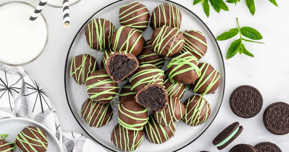 overhead shot of Mint Oreo Truffles on a plate with one split in half