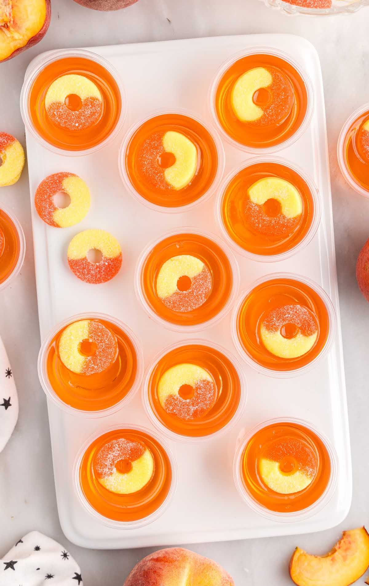 overhead shot of Peach Jello Shots on a tray