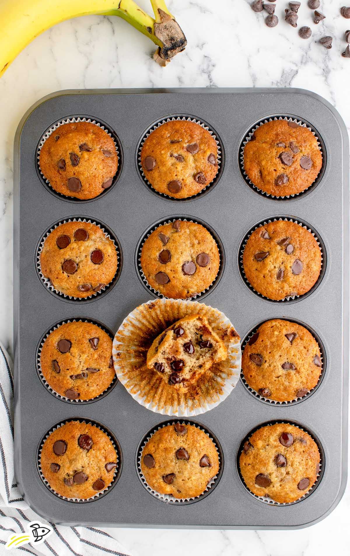 overhead shot of Banana Chocolate Chip Muffins in a muffin pan