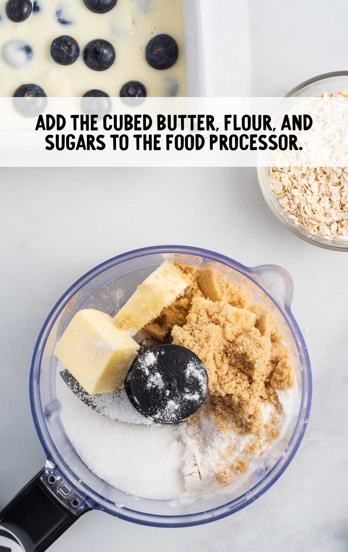 butter, flour, and sugar added to a food processor