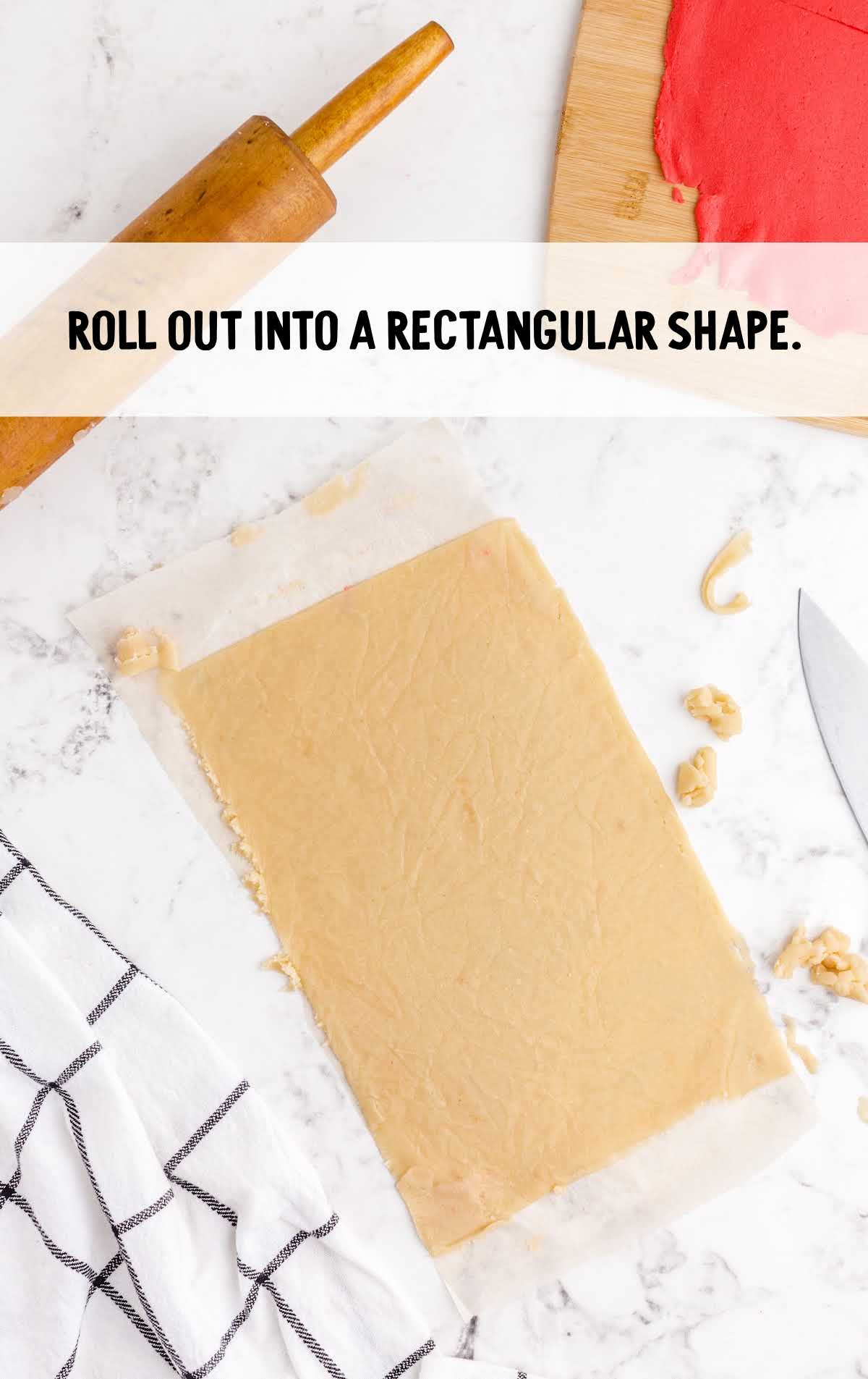 Roll out dough into rectangular sharpe