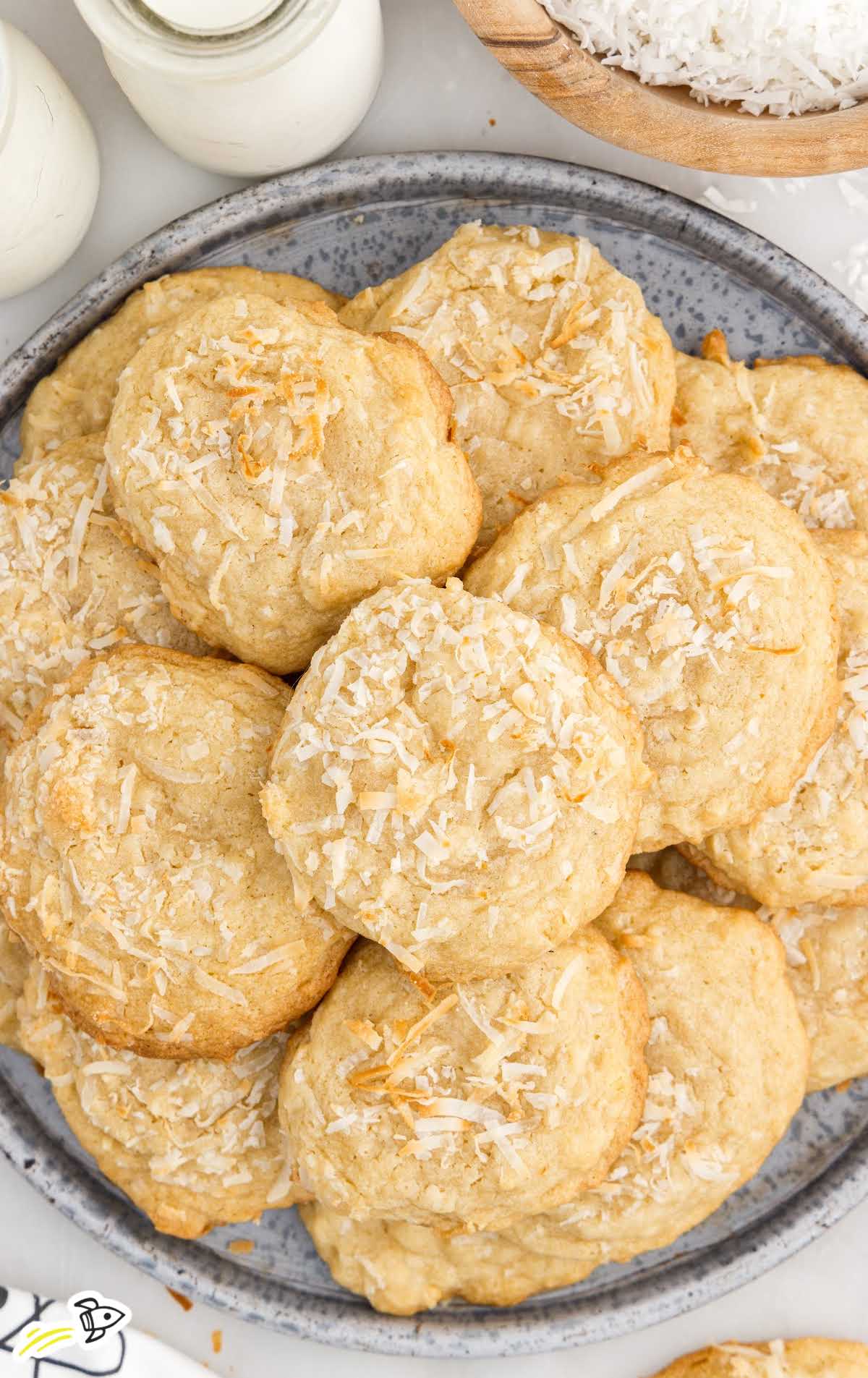 overhead shot of Coconut Cookies on top of each other on a plate