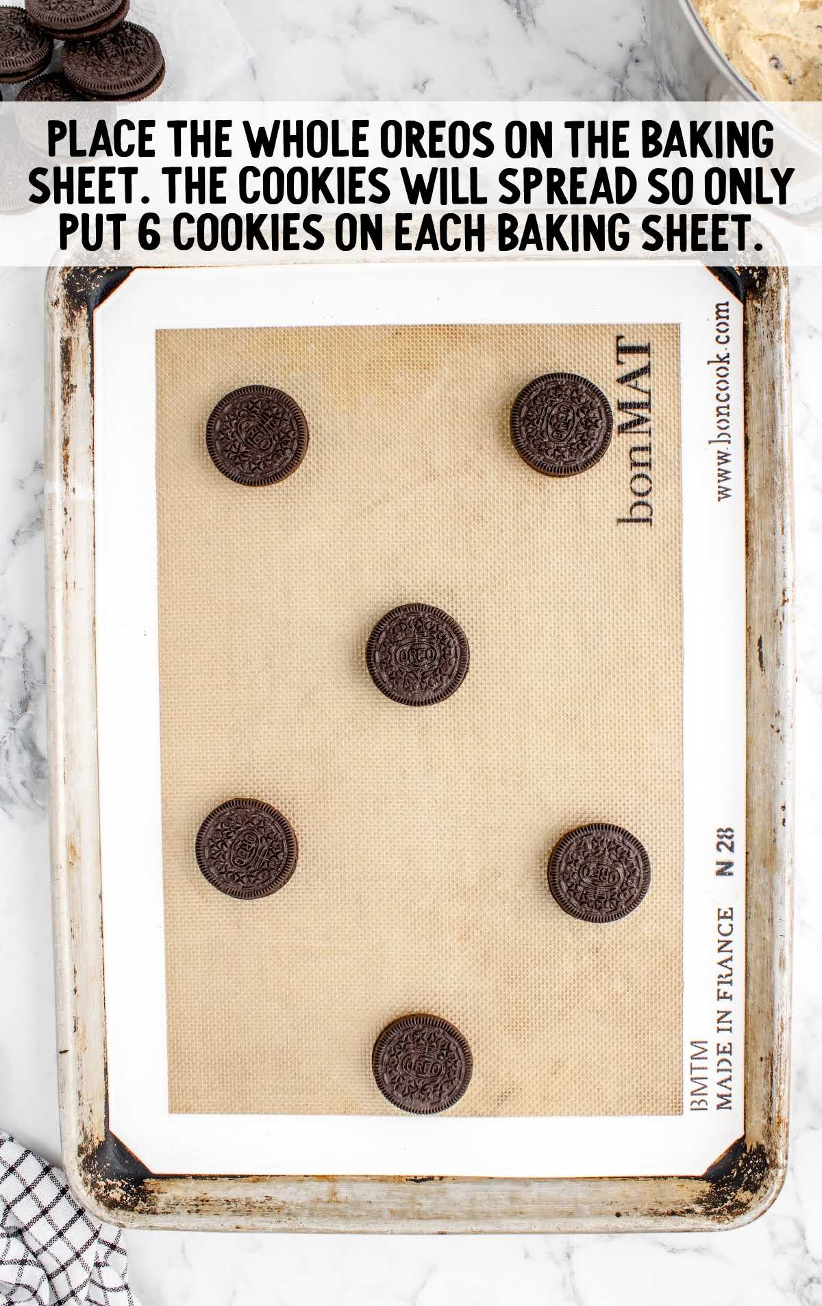 oreos placed in a baking sheet spread out