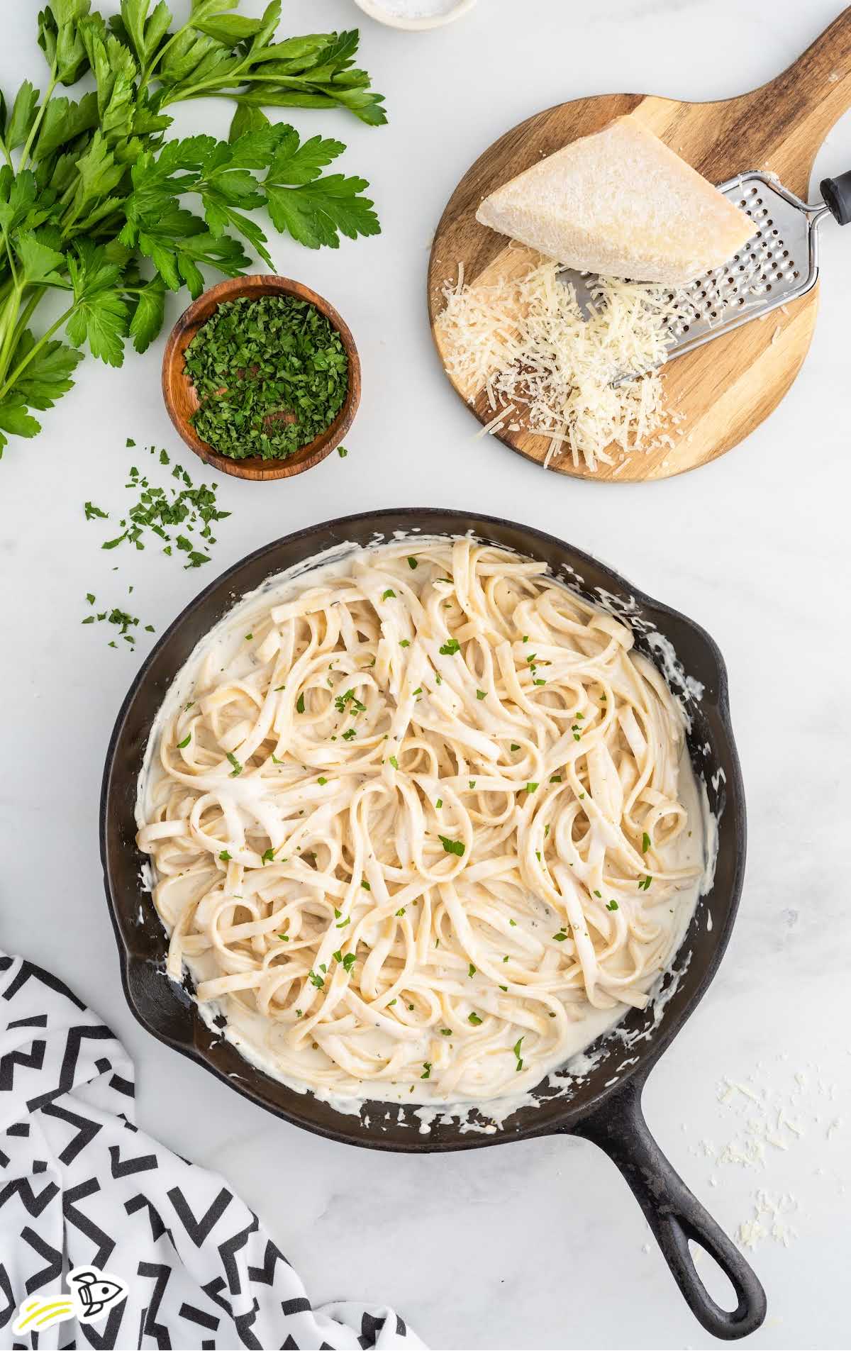 overhead shot of Cream Cheese Pasta Sauce with noodles in a pan