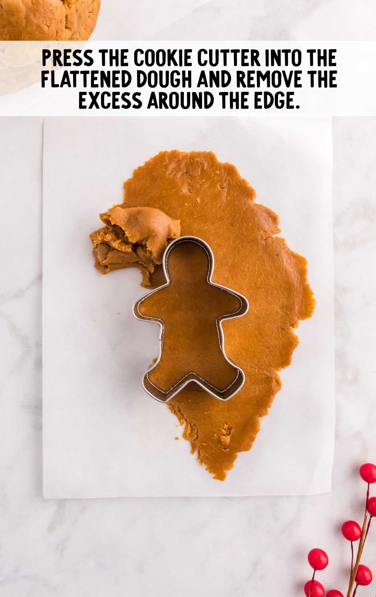 use cookie cutter to cut dough and remove the excess around edges