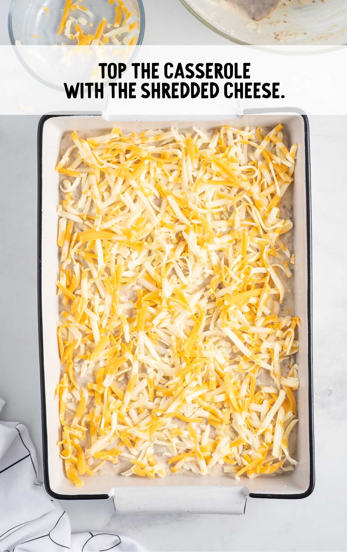 shredded cheese topped on top of the casserole