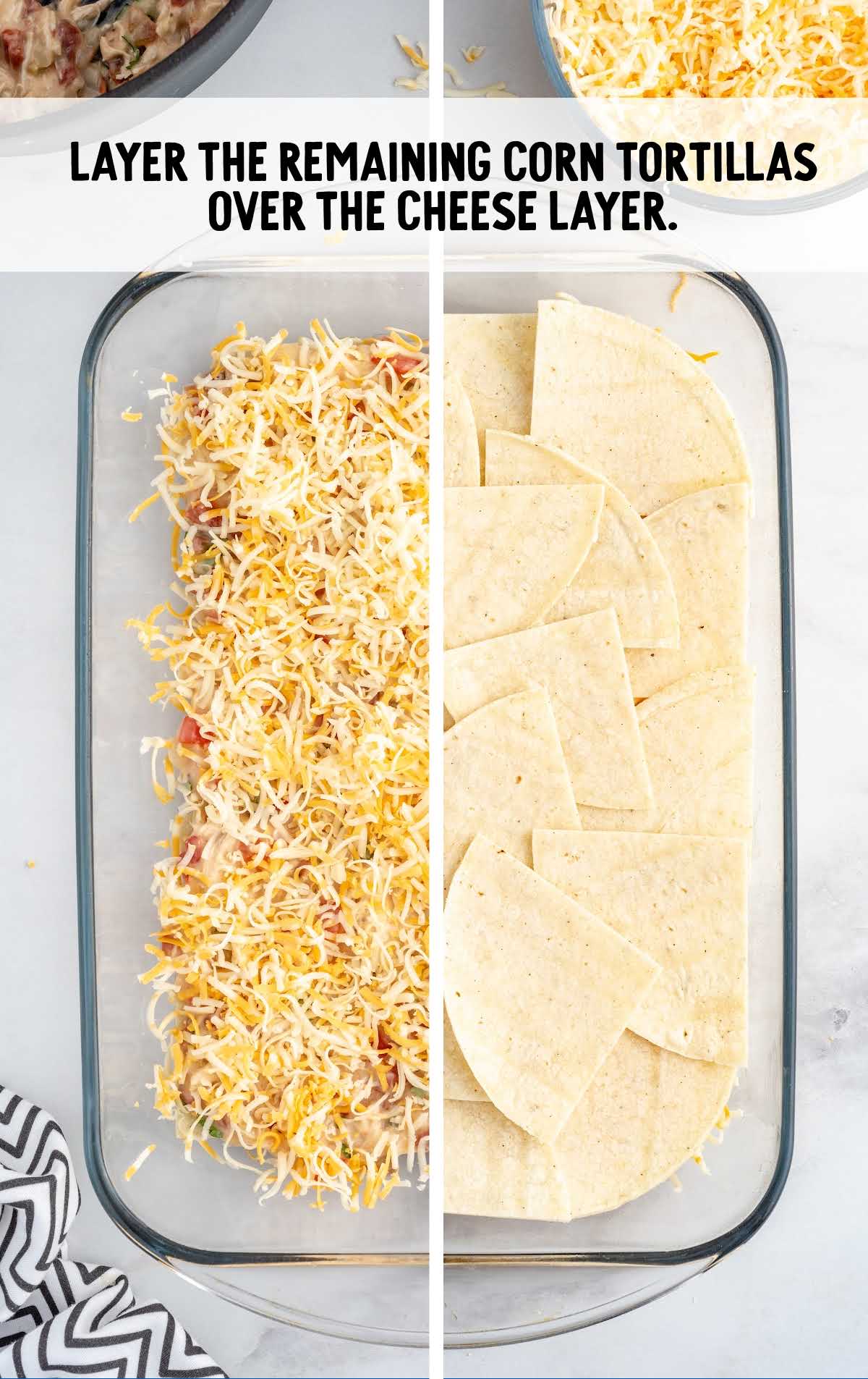 tortillas layed over the cheese layer in a baking dish