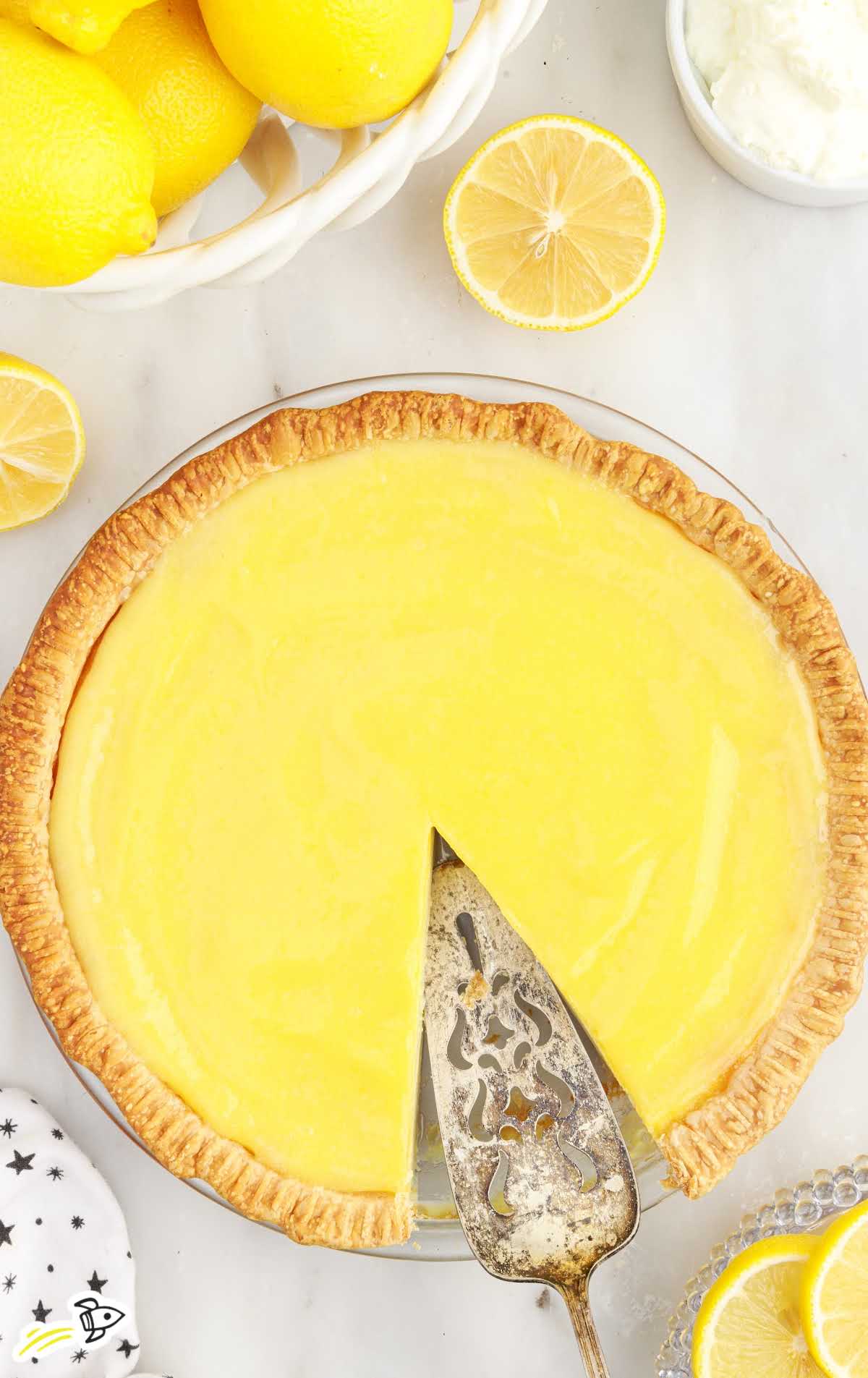 overhead shot of Lemon Custard Pie with a slice taken out of it