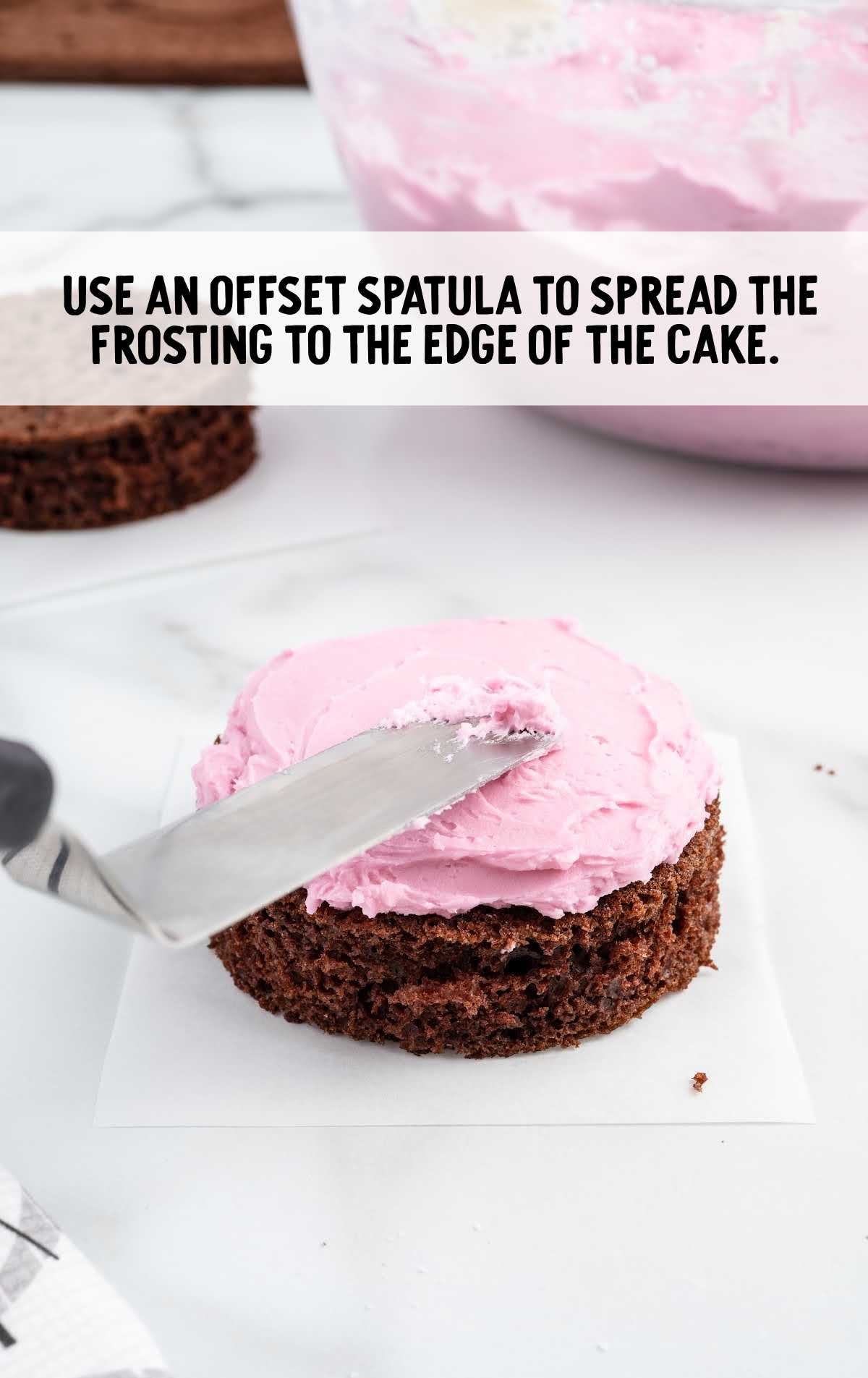 spread frosting with spatula to the edge of the cake