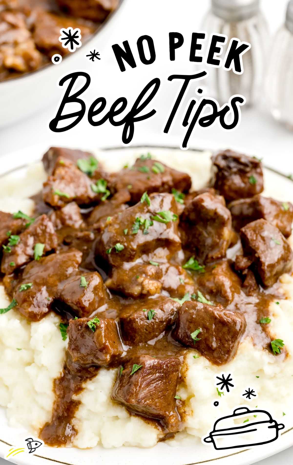 a close up shot of No Peek Beef Tips with mashed potatoes on a plate
