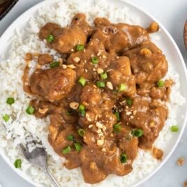 overhead shot of Peanut Butter Chicken with rice on a plate