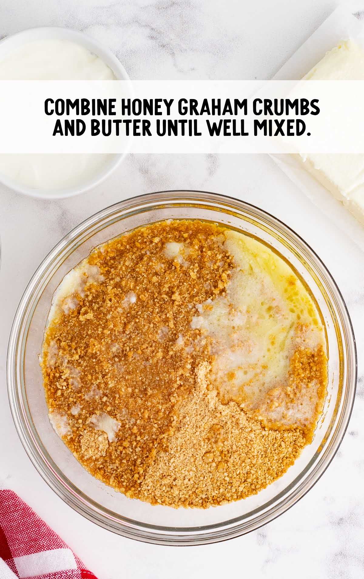 honey graham crumbs and butter combined together