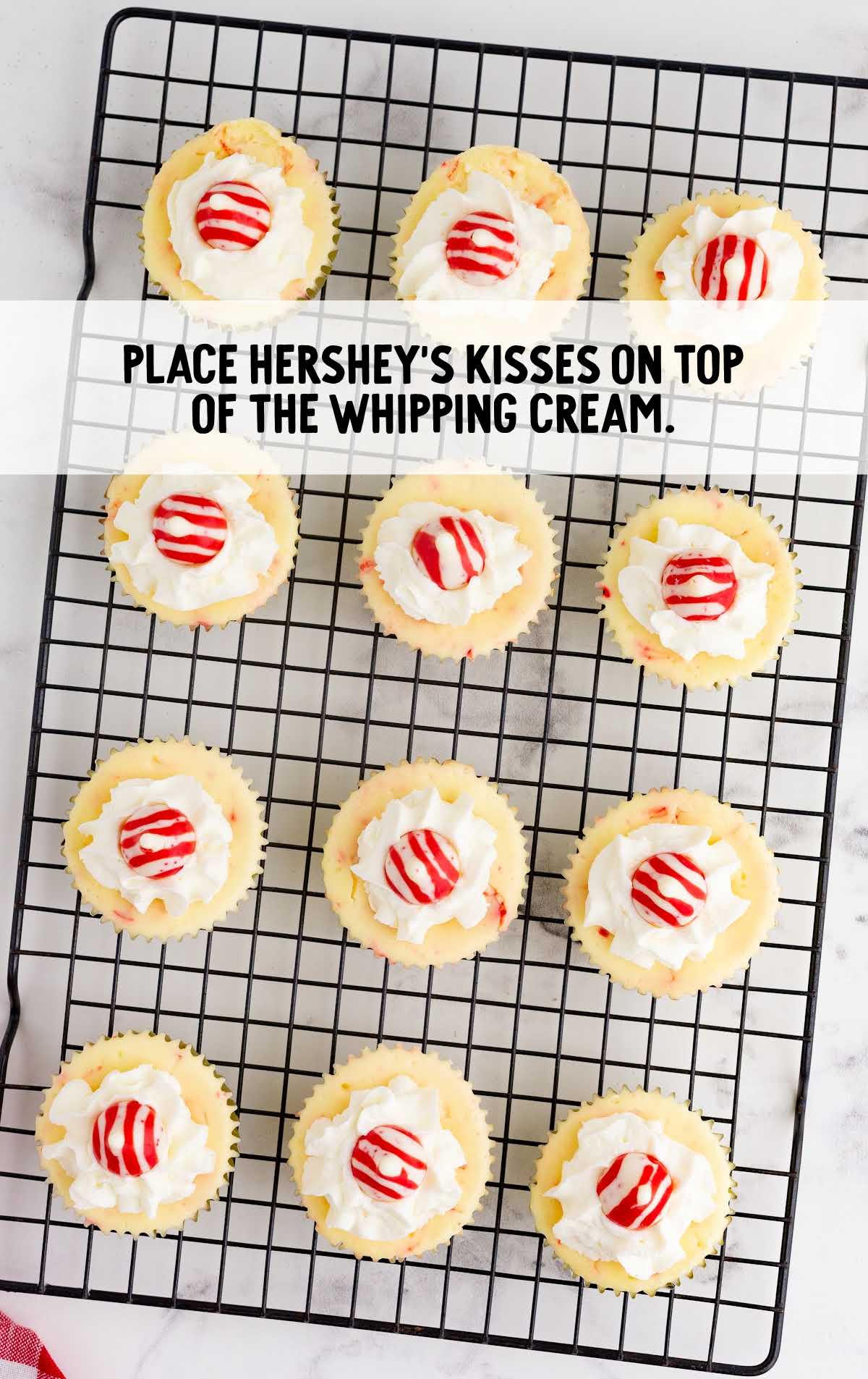 Hershey's kisses placed on top of the whipping cream