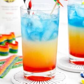 a close up shot of a couple of Rainbow Cocktail
