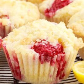 a close up shot of Raspberry Lemon Muffins