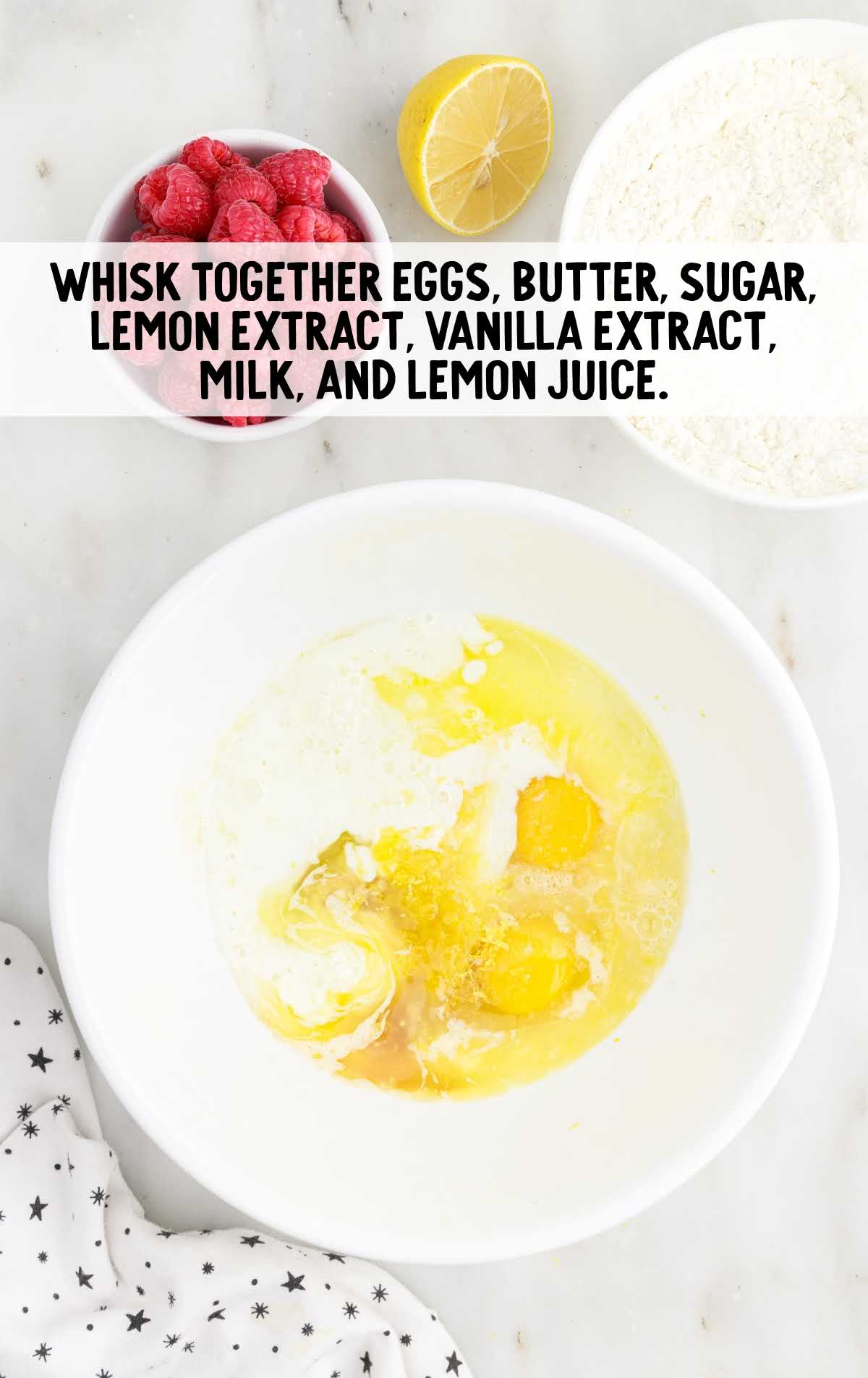 eggs, butter, sugar, lemon extract, vanilla extract, milk, and lemon juice whisked together