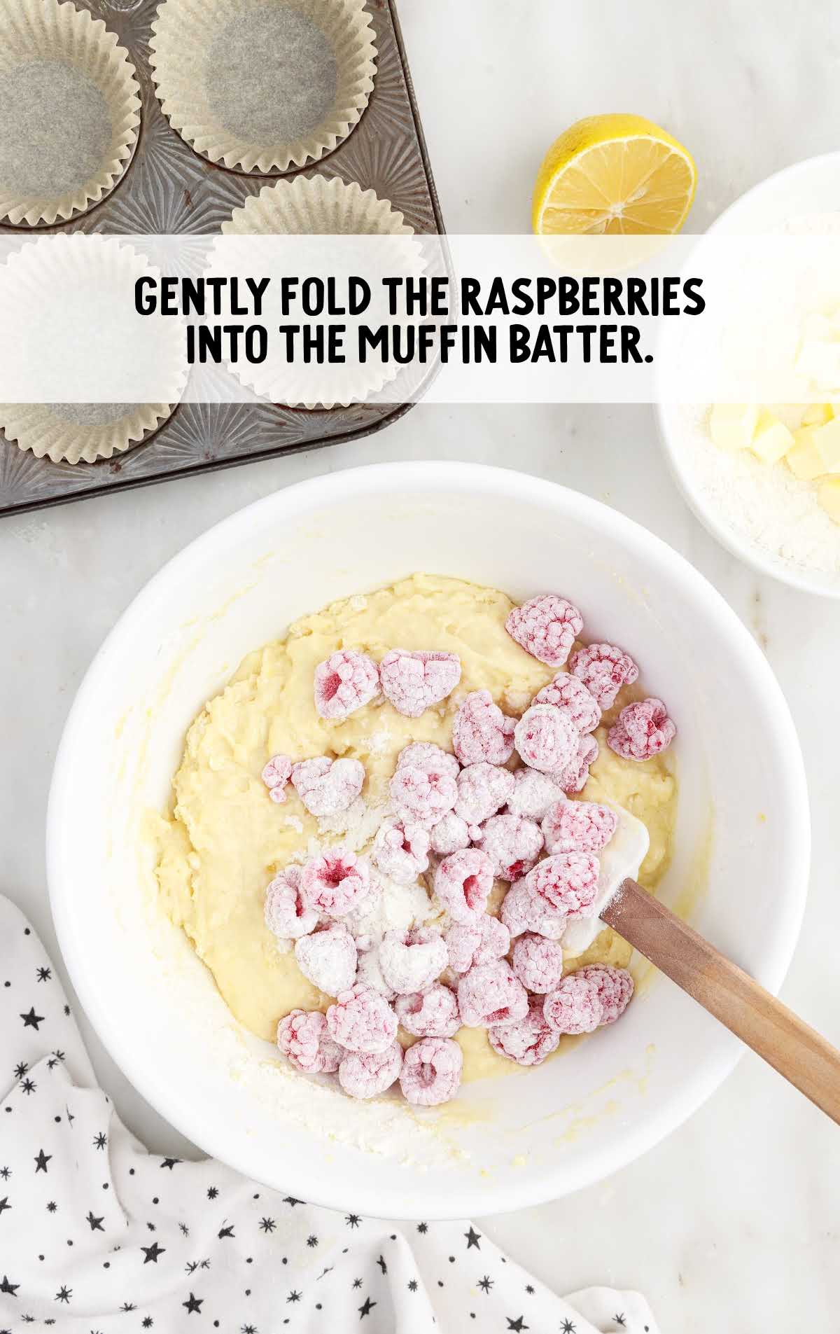 raspberries folded into the muffin batter