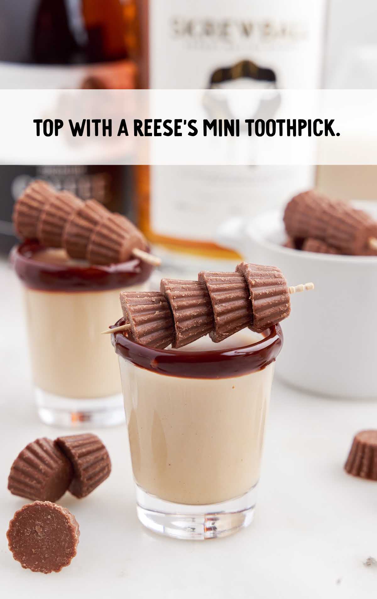 Reese Cup Shot topped with Reese's mini on a toothpick