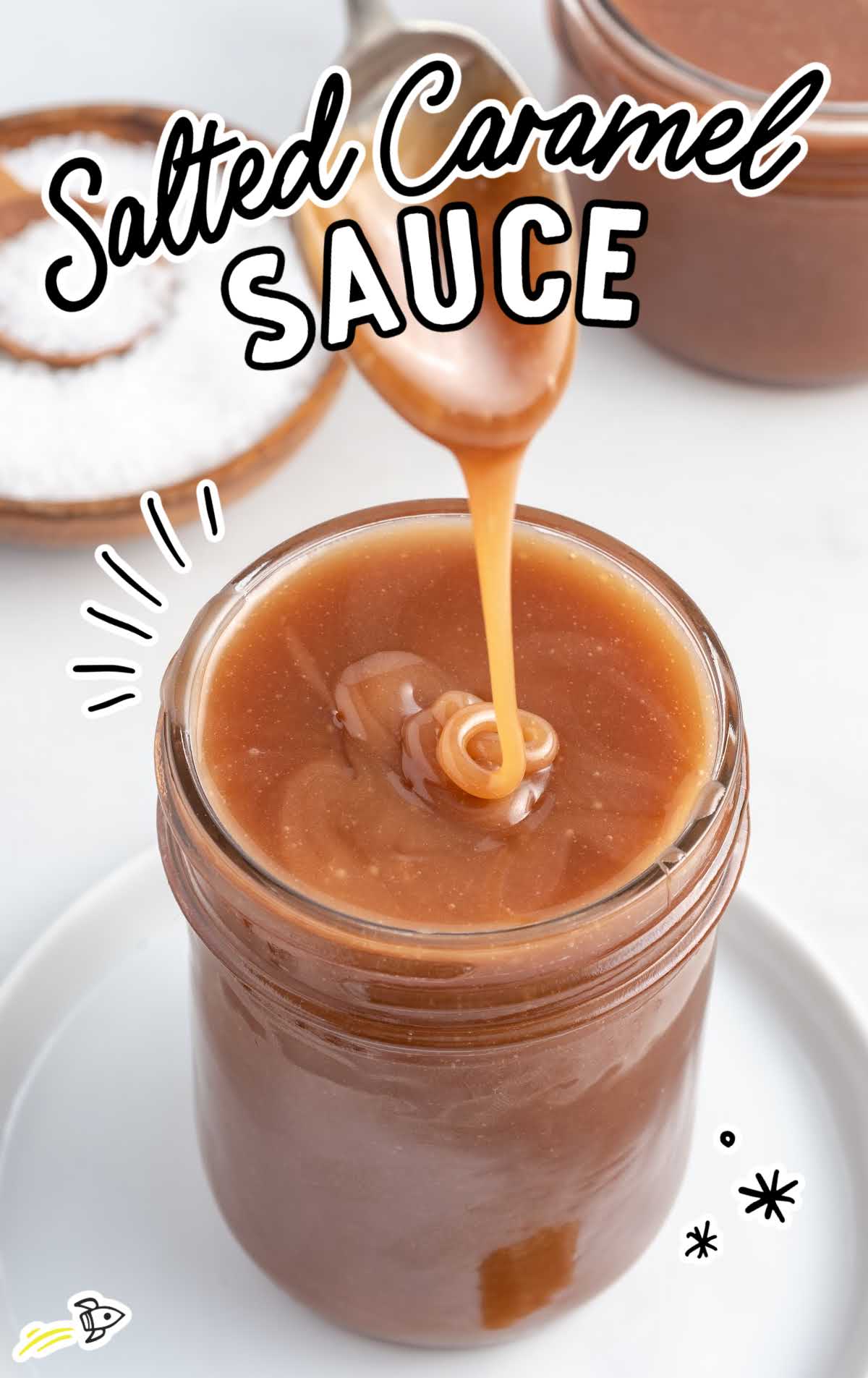 a close up shot of Salted Caramel Sauce in a mason jar