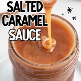a close up shot of Salted Caramel Sauce in a mason jar