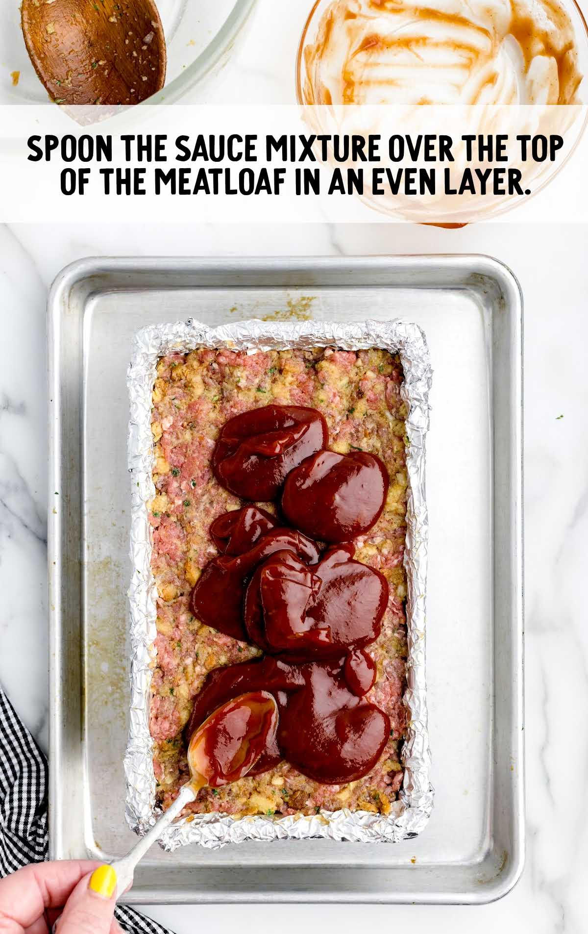 sauce mixture spooned over the top of the meatloaf