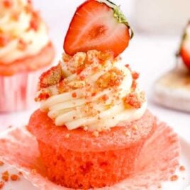 a close up shot of a Strawberry Crunch Cupcake