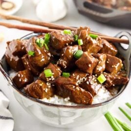 a close up shot of Teriyaki Steak Bites in a bowl with rice