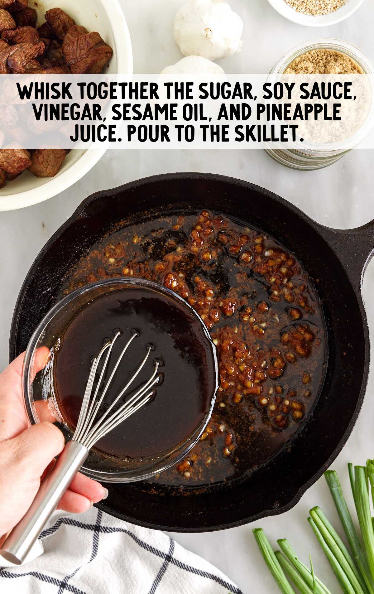 sugar, soy sauce, vinegar, sesame oil, and pineapple juice whisked in a skillet