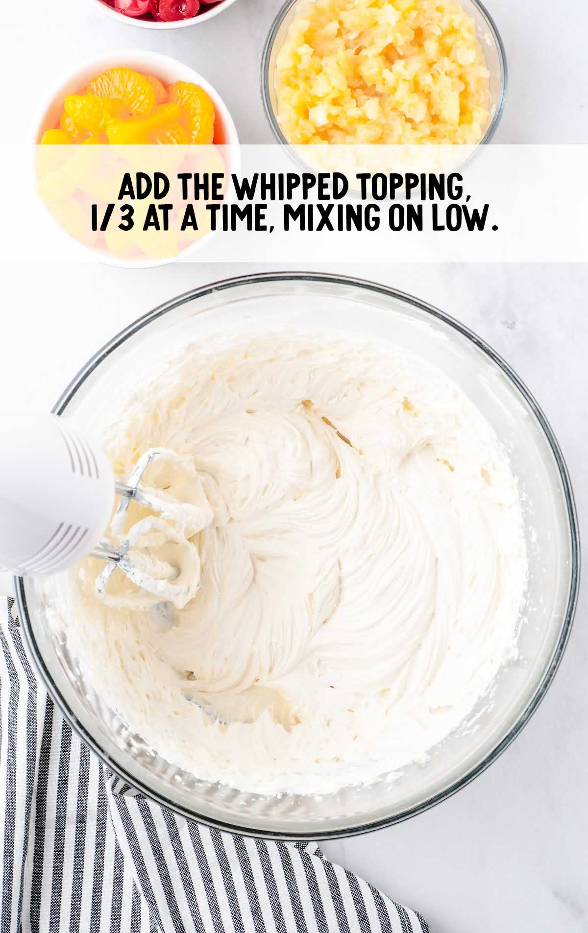 whipped topping added to the cream cheese and blended together