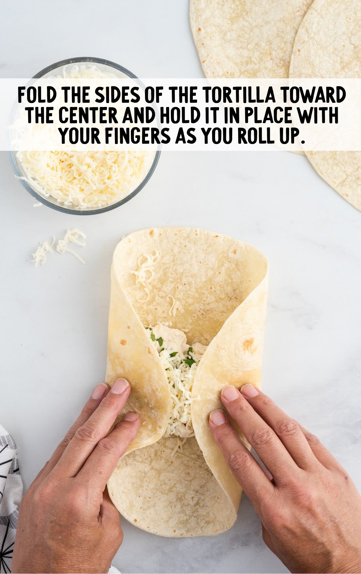 fold sides of the tortilla towards the center