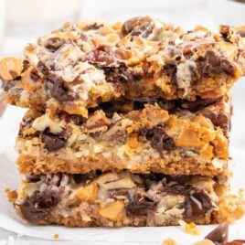 a close up shot of 7 Layer Bars stacked on top of each other