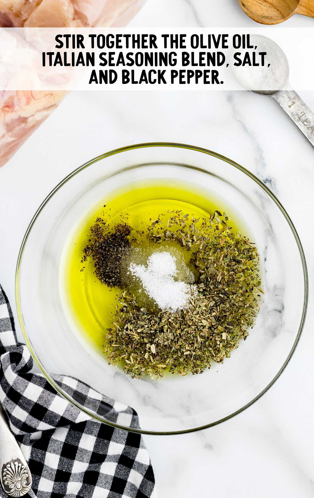 olive oil, Italian seasoning blend, salt, and black pepper stirred in a bowl