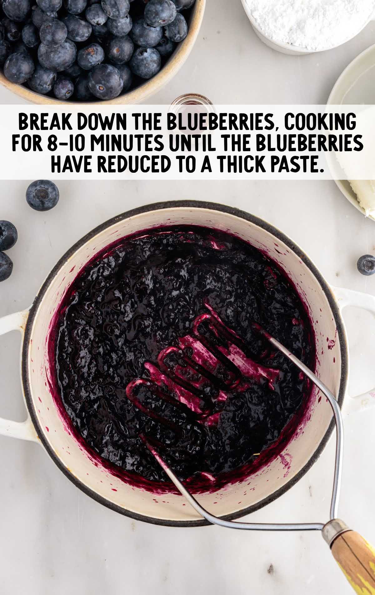 blueberries broken down and cooked in a pot
